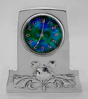 Archibald Knox. Liberty & Co. Silver clock. 